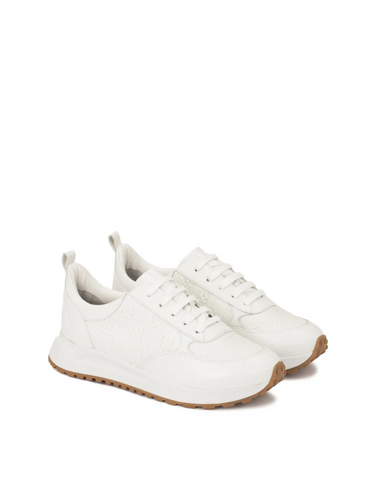 Białe sneakersy w monogramy z łączonych skór