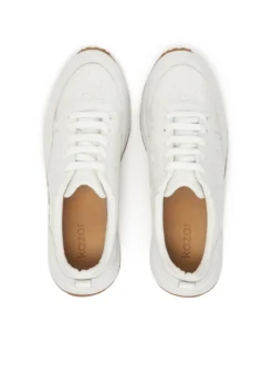 Białe sneakersy w monogramy z łączonych skór