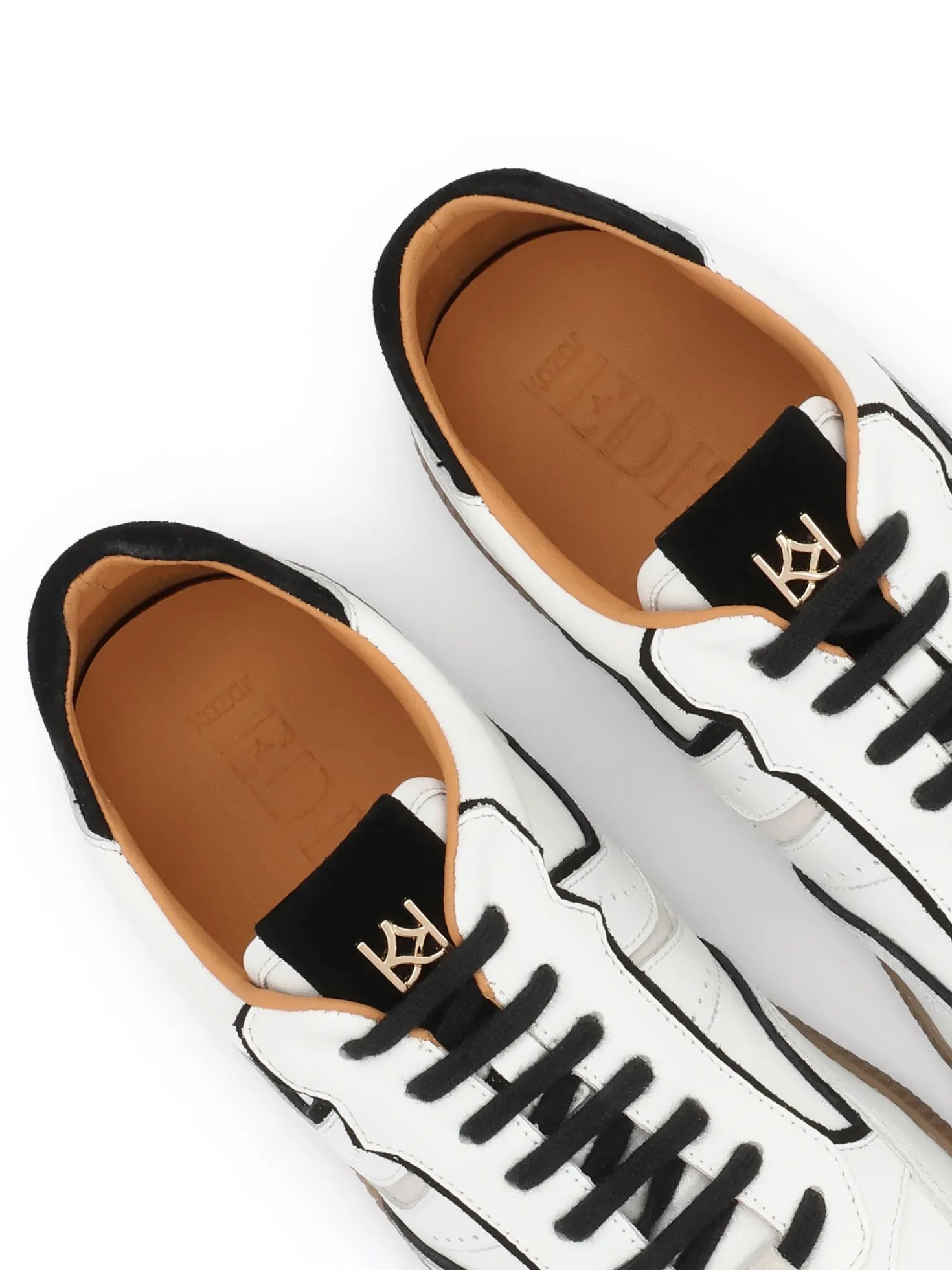 Biało-czarne sneakersy ze skóry z wzorem zamszowych wstawek