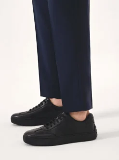 Czarne skórzane sneakersy z gumą na pięcie