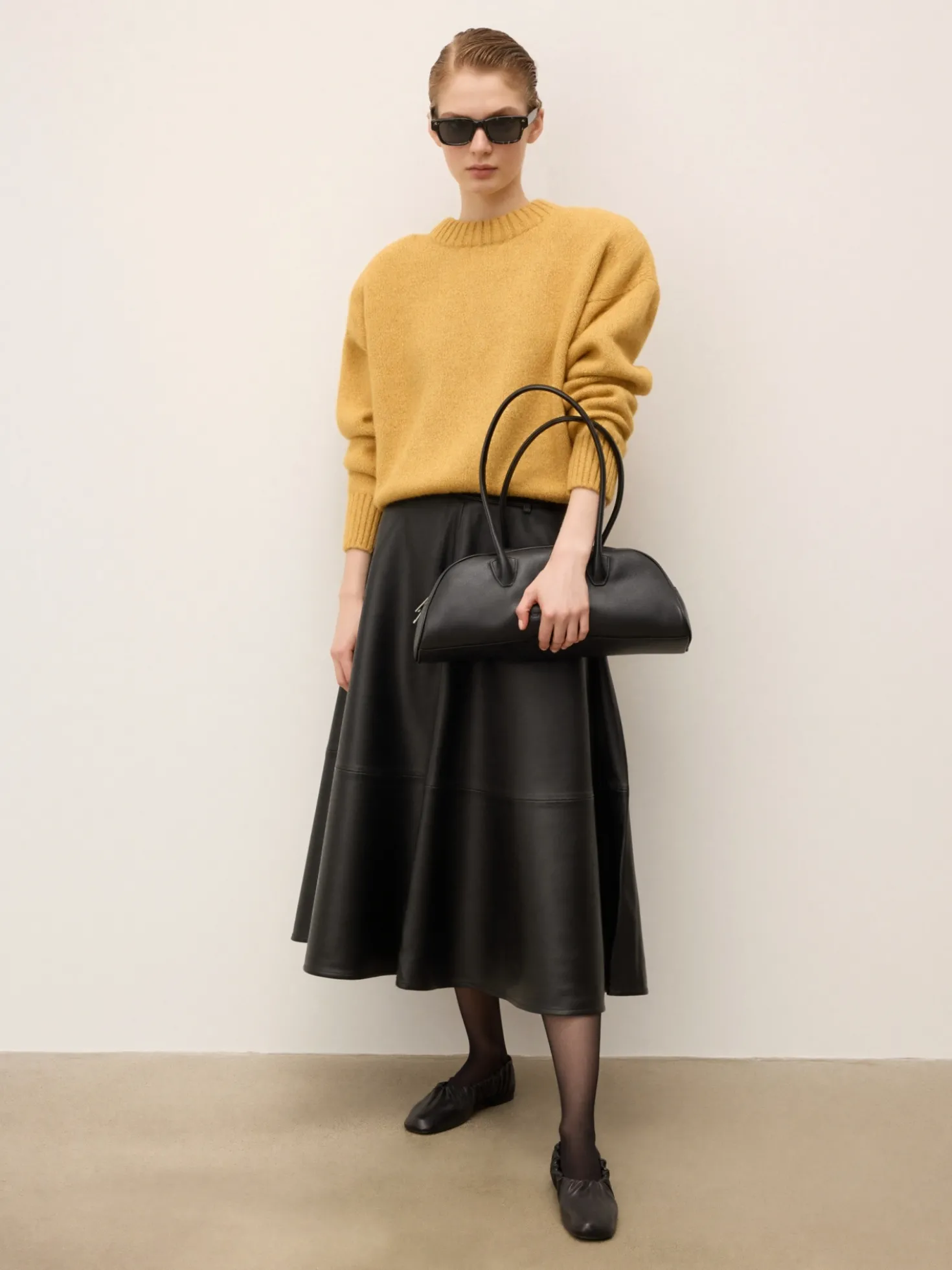 Modna torebka w kształcie baguette bag