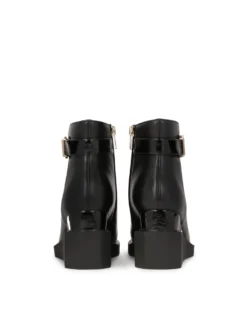Skórzane botki na dwupoziomowym koturnie