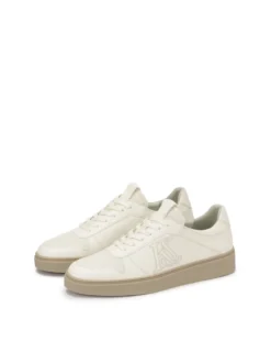 Skórzane sneakersy w kolorze złamanej bieli z wyszywanym logo